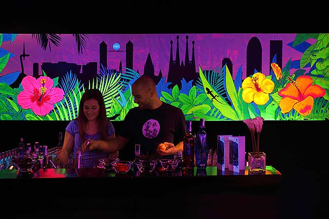 blacklight paintings make a colorful bar wall decoration