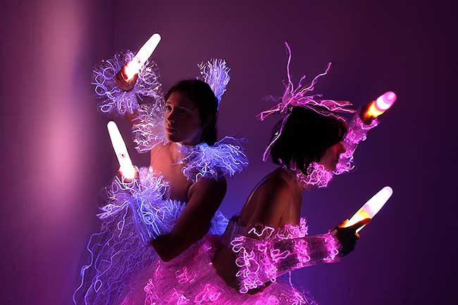 Black light shows for corporate events with glow in the dark costumes